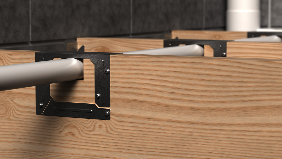 SNRK - Solid Joist Notch Reinforcement Traditionally, solid joists are notched to allow services. This can reduce their strength and exposes the services to possible screw/nail penetration when the floor is fixed. Opportunity to find a way to both strengthen the joists and protect services from above.